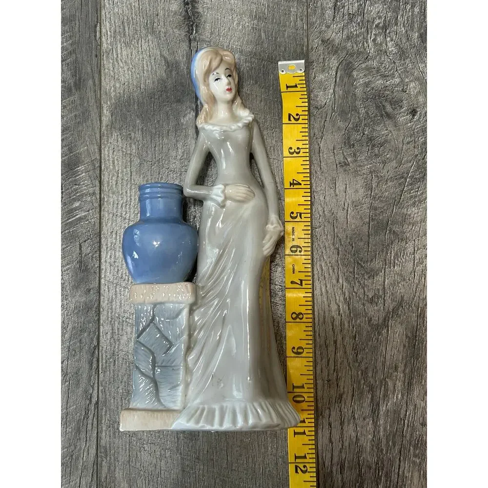 VTG Porcelain Women with small Vase- blue and white- bottom crack bid vase